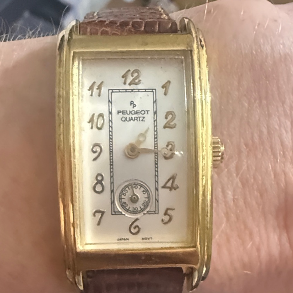 Peugeot Gold curvature Watch with Brown leather Strap